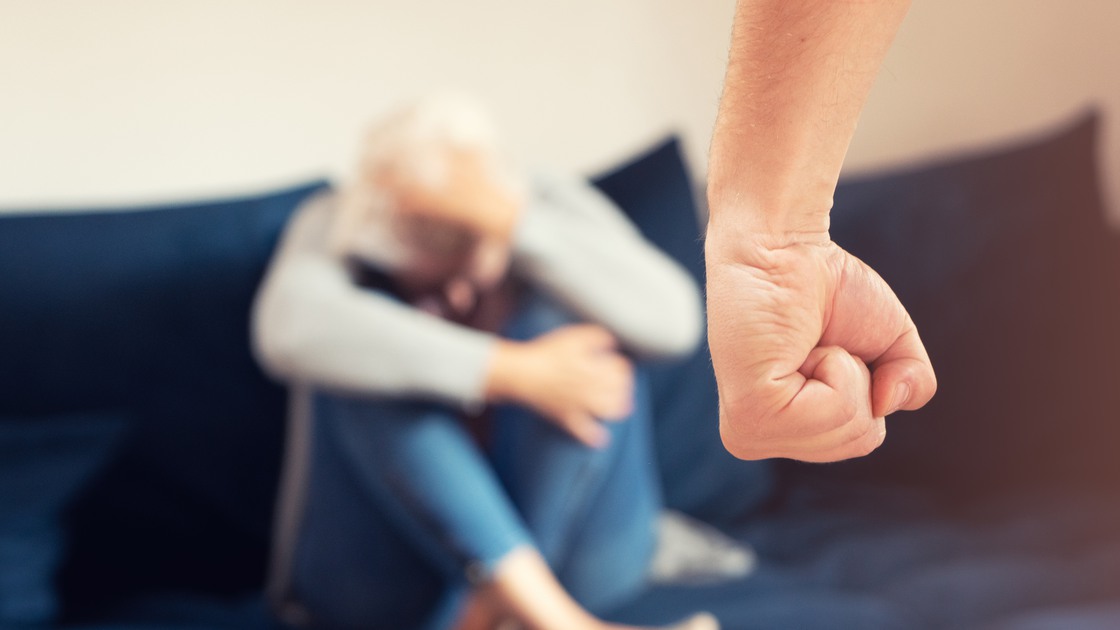 Domestic violence and physical fight in relationship. Angry violent man, aggressive fist.